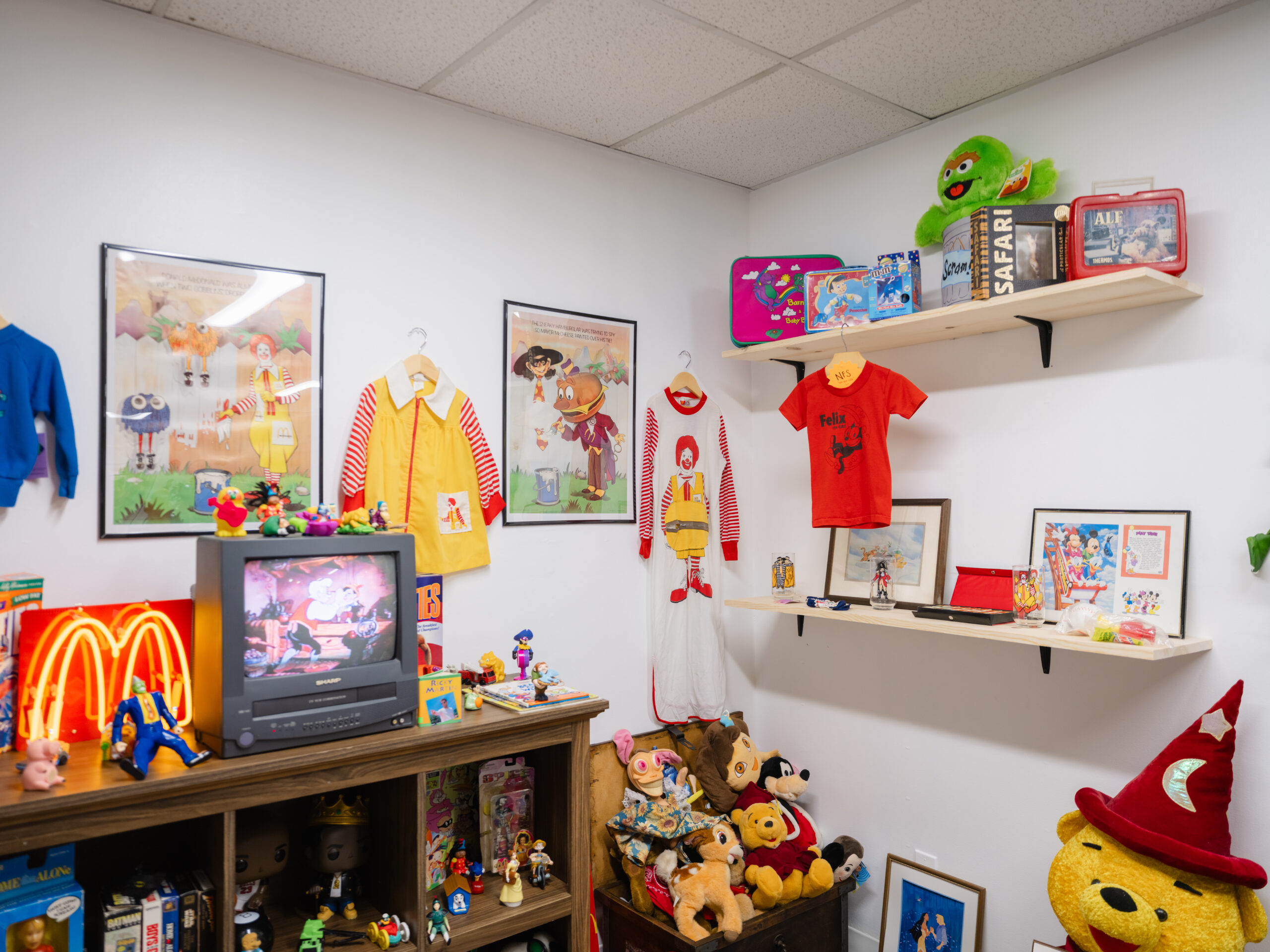 Eyespeak Vintage – shelves of vintage toys, plush characters and retro memorabilia inside the collectibles shop.