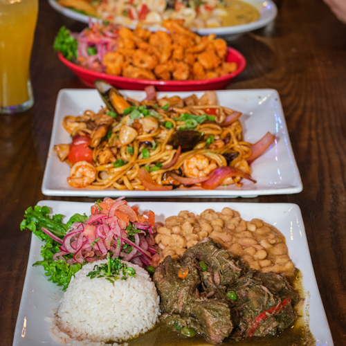 Photo of lomo saltado and other peruvian dishes from Natalie Peruvian Seafood Restaurant